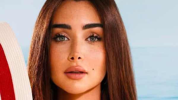 هنا الزاهد ترتدي فستانًا أحمر أنيقًا في جلسة تصوير جديدة